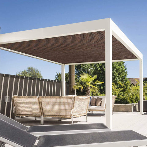 Eden's Decor shade sail protecting garden and plants from sun.