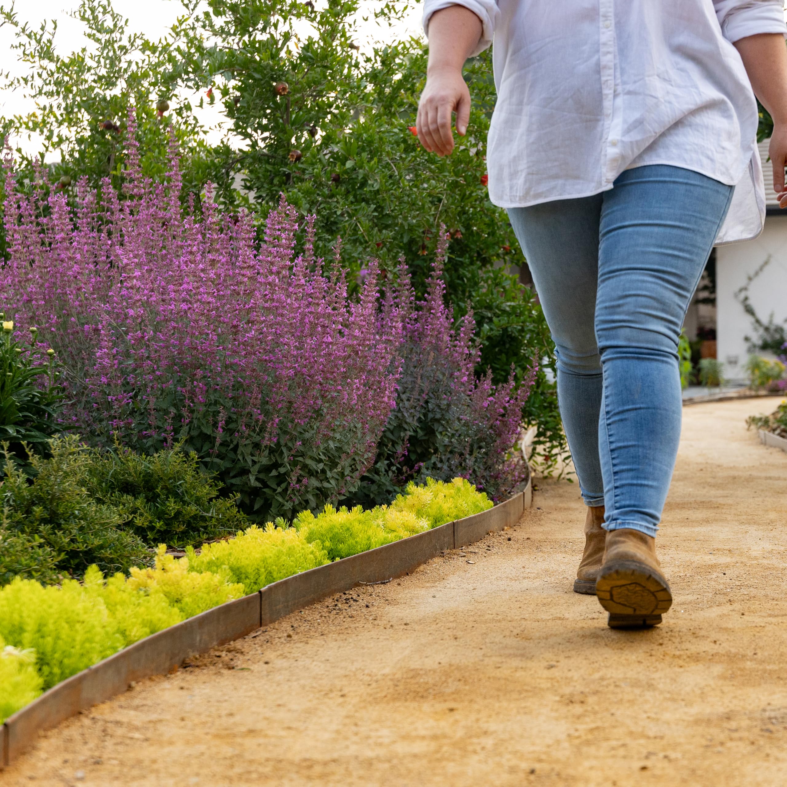 Edge Right curved-friendly steel enables neat curves along garden beds.