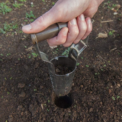 Edward Tools bend-free bulb planter reduces strain while digging.
