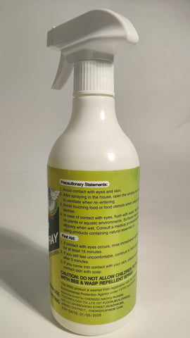 Family enjoys outdoor time with Eglagen spray nearby.