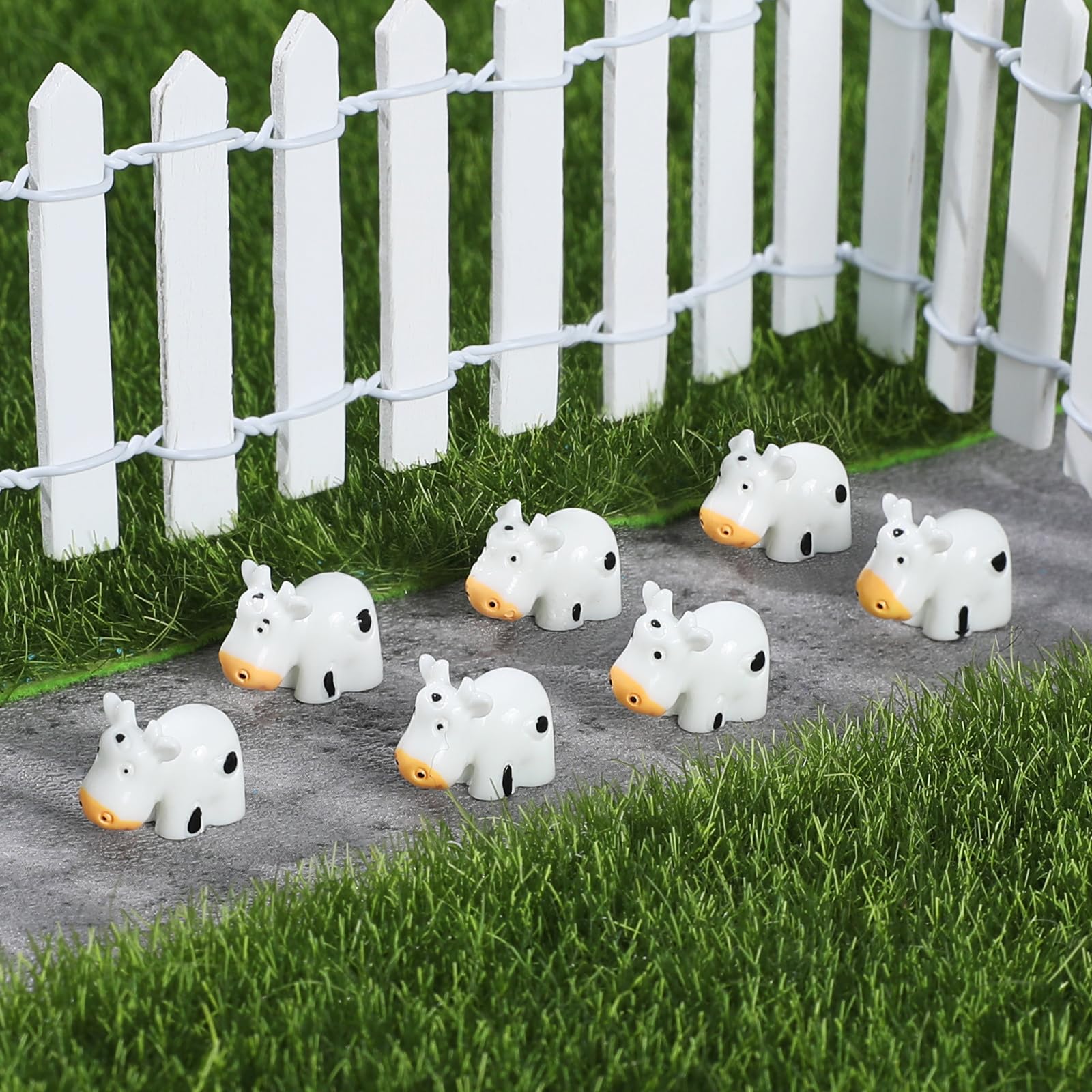 EKisemio mini cows figures for potted plants add whimsy and DIY appeal.