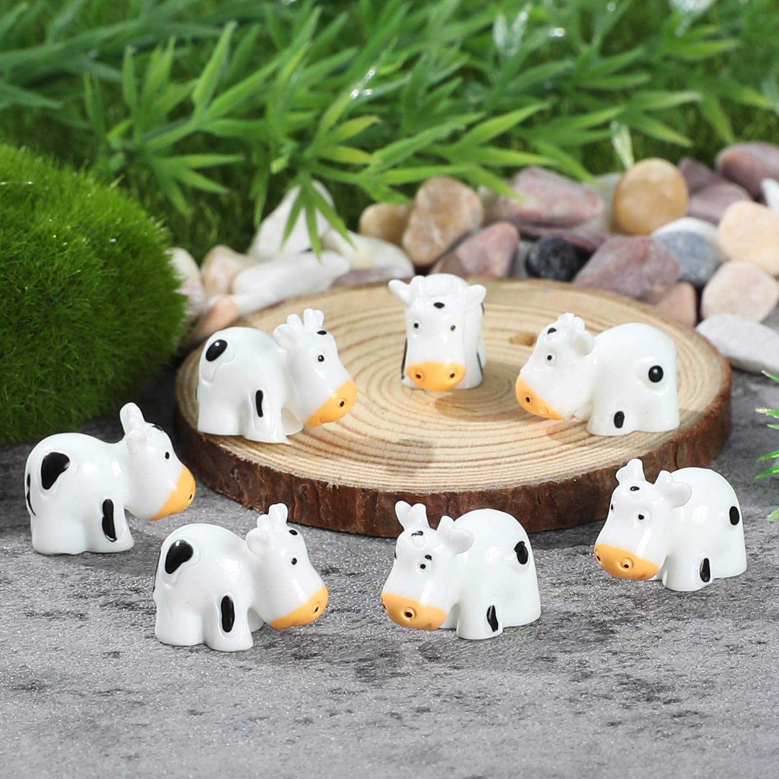 EKisemio waterproof mini cows ornaments withstand rain while keeping colors vibrant.