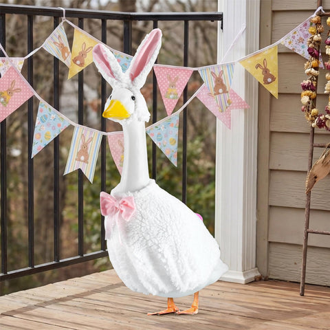 EKOREST Easter goose outfit hat-ears on statue for playful Easter look