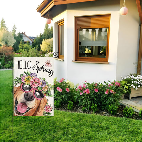 Farmhouse yard decor flag for spring on a sunny lawn.
