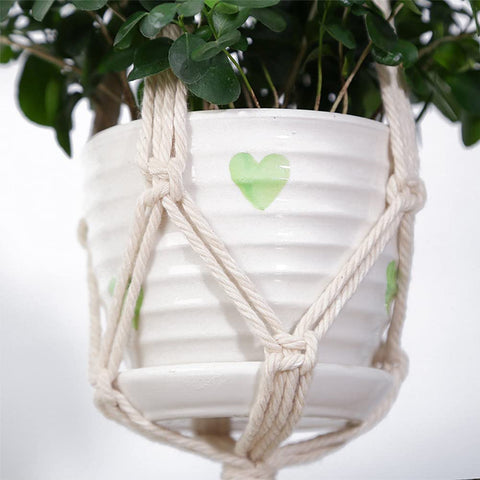 ELANE indoor-outdoor hanging plant holder demonstrates versatile placement options