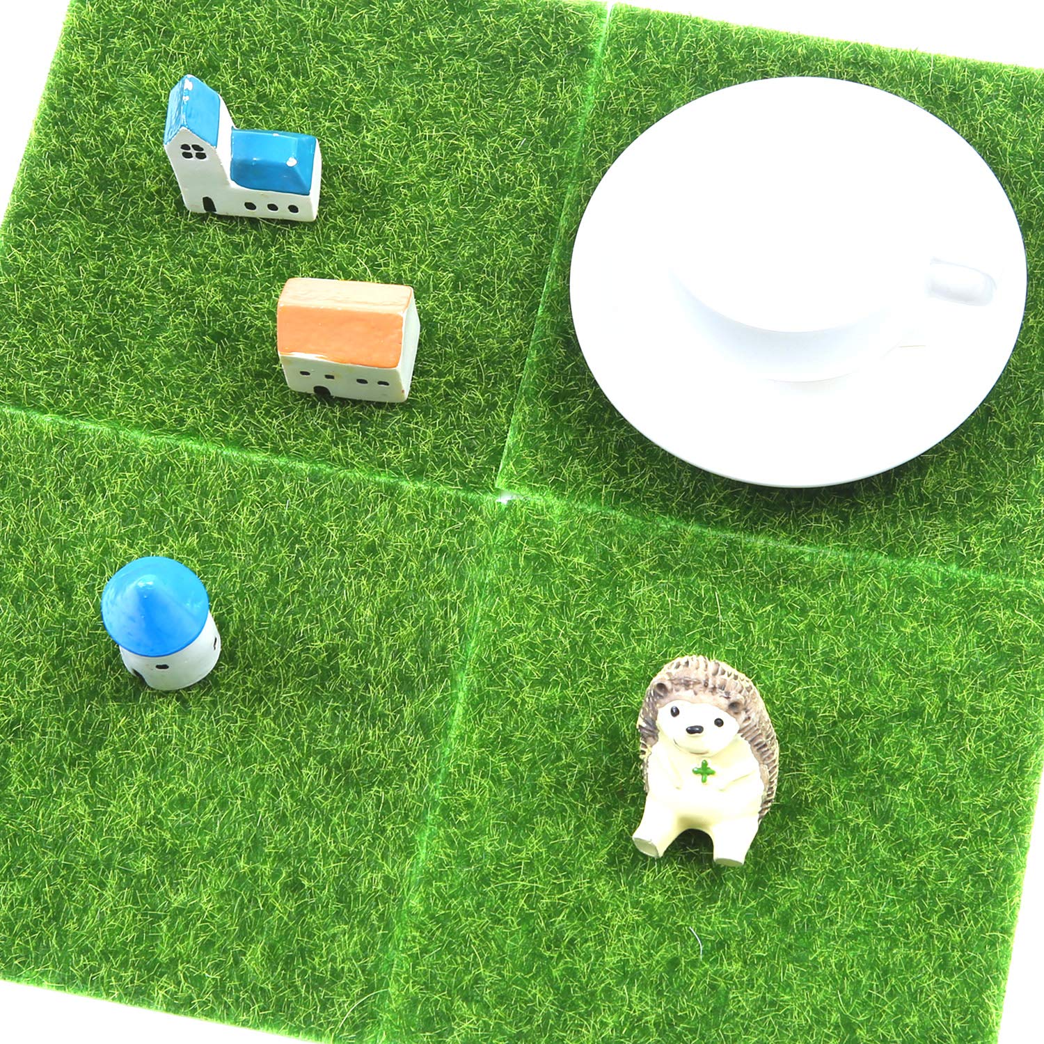Elcoho artificial grass for dollhouse decoration adds realistic greenery.