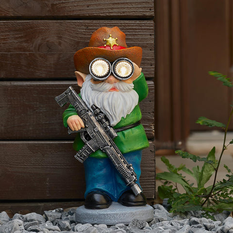 Elegondrar garden gnome with telescope lights paths at night for welcoming outdoor ambiance.
