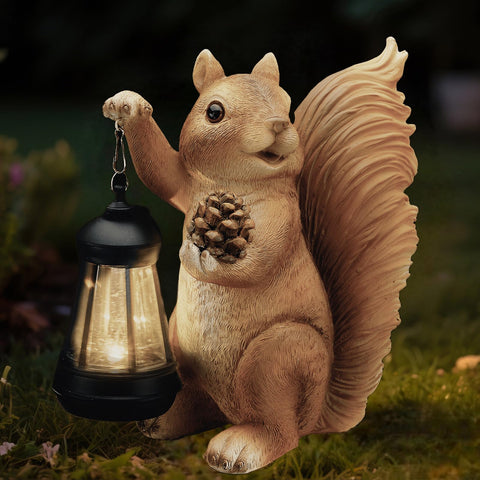 Elegondrar solar squirrel garden statue with lantern lights your yard at night.