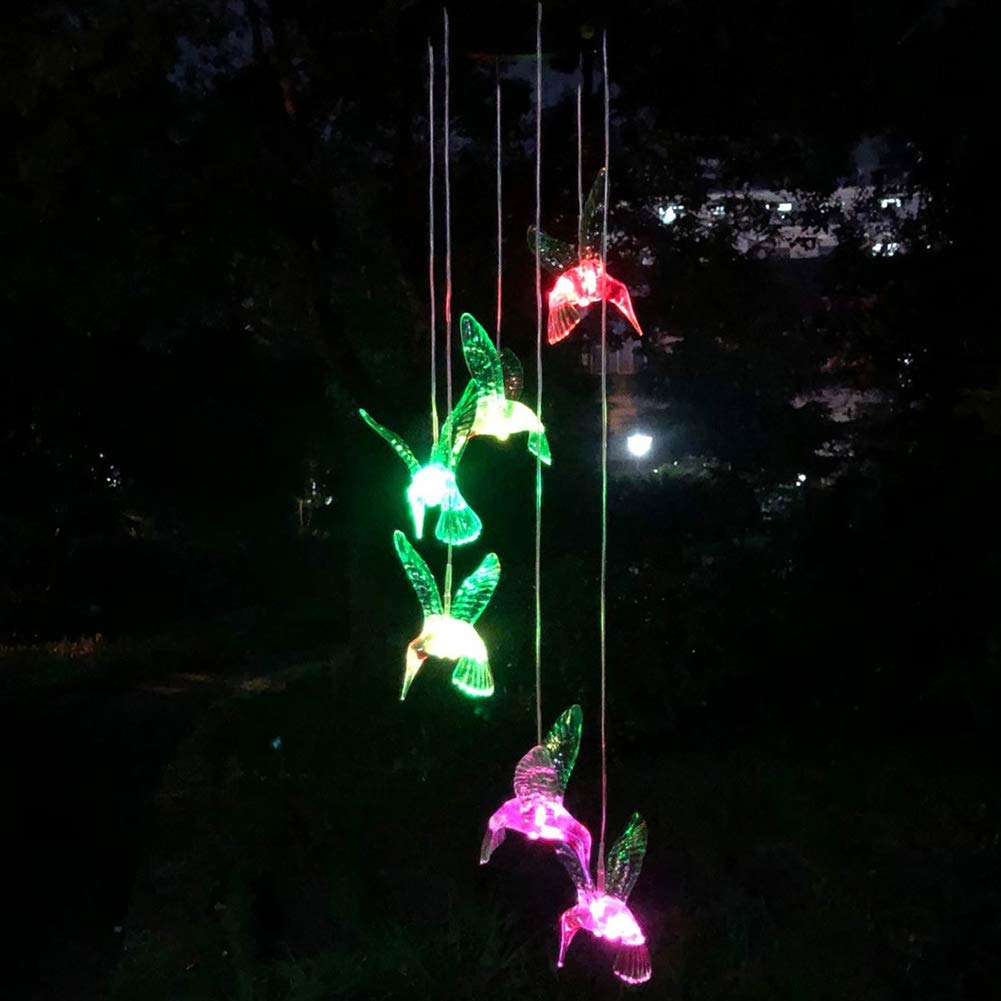 Color-changing lights from Eleven Direction hummingbird solar chimes provide outdoor ambiance.