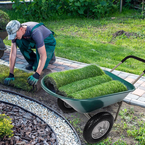 Elevon wheelbarrow supports up to 300 pounds for tough yard jobs.