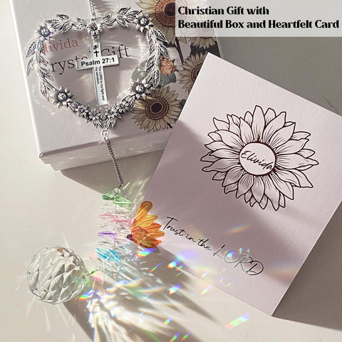 Elivida crystal suncatcher reflecting sunlight to brighten any room.