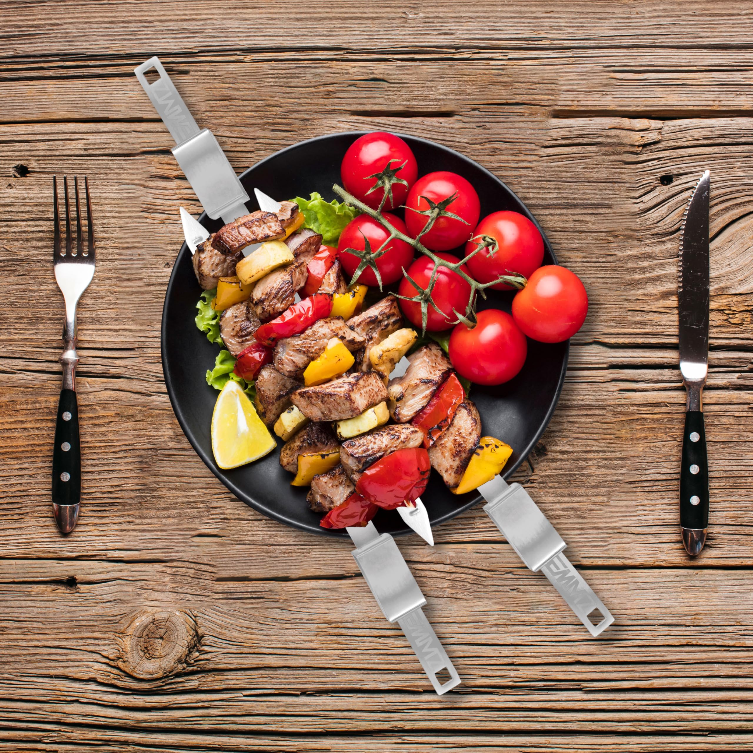 outdoor camping scene with emmz skewers on charcoal grill