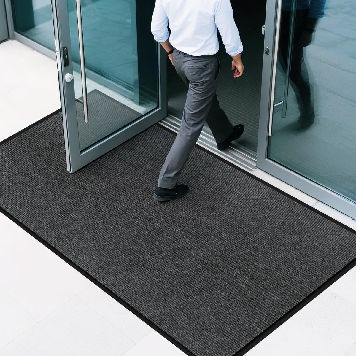 EMQIMA front door mat 3x5 heavy duty demonstrates non-slip performance for busy entryways.