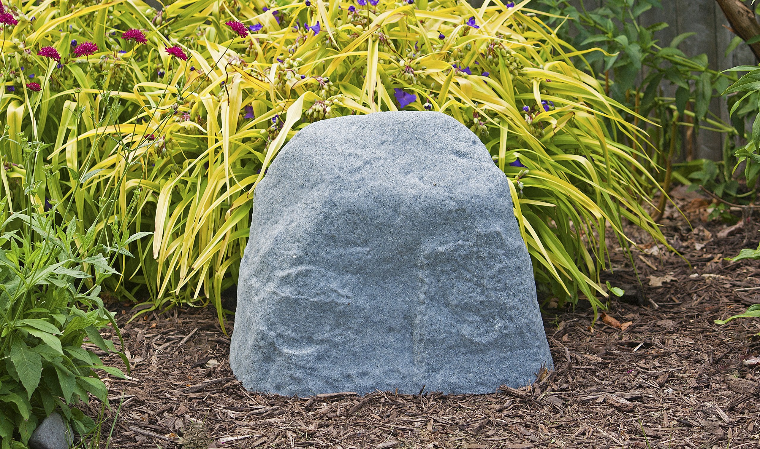Emsco Group 2186 landscape rock well-cover demonstrates utility by concealing underground fixtures