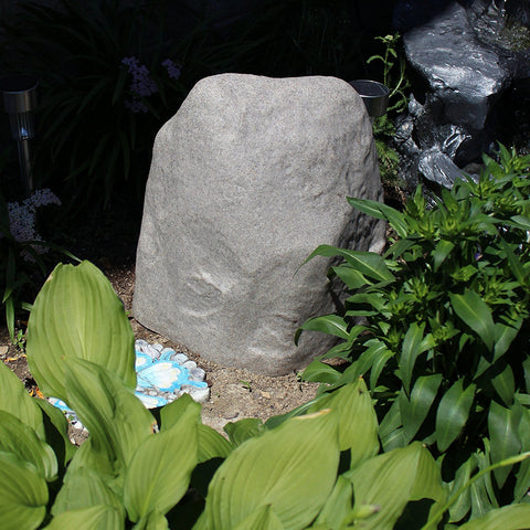 Emsco 2187 landscape rock with two stakes for secure ground anchoring.