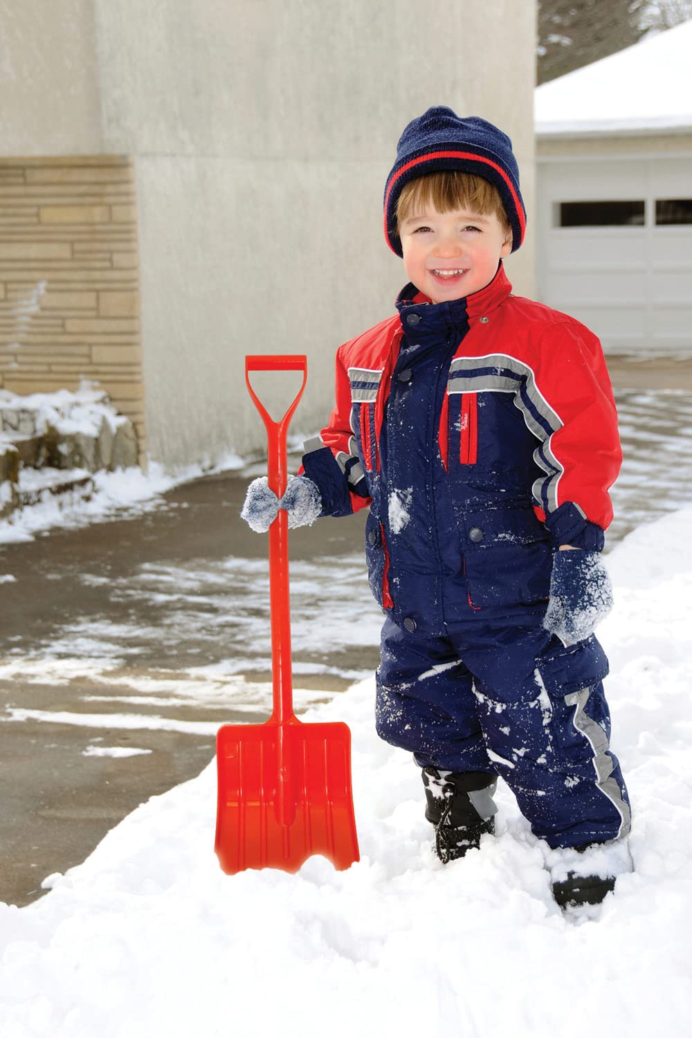 EMSCO Bigfoot toddler snow shovel blade in action for easy snow clearing.