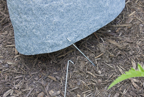 Emsco 2280 rock blending into garden borders for a natural look