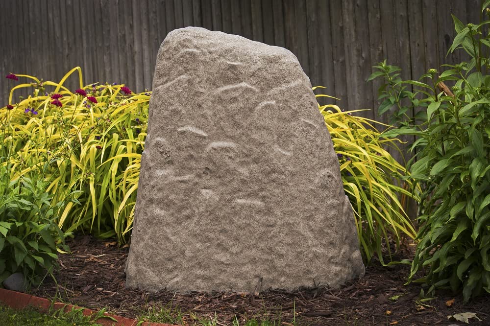 Emsco 2280 rock concealing a well pipe or sprinkler valve in yard