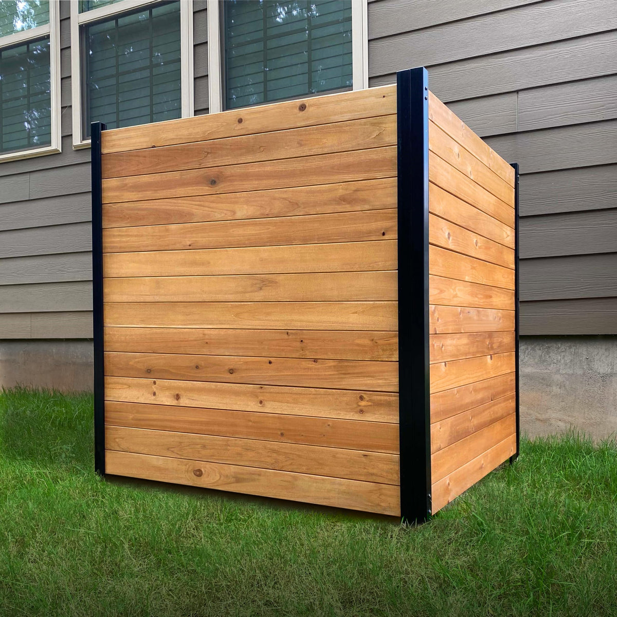 Enclo Richmond cedar wood privacy screen shows natural grain during assembly for outdoor privacy.