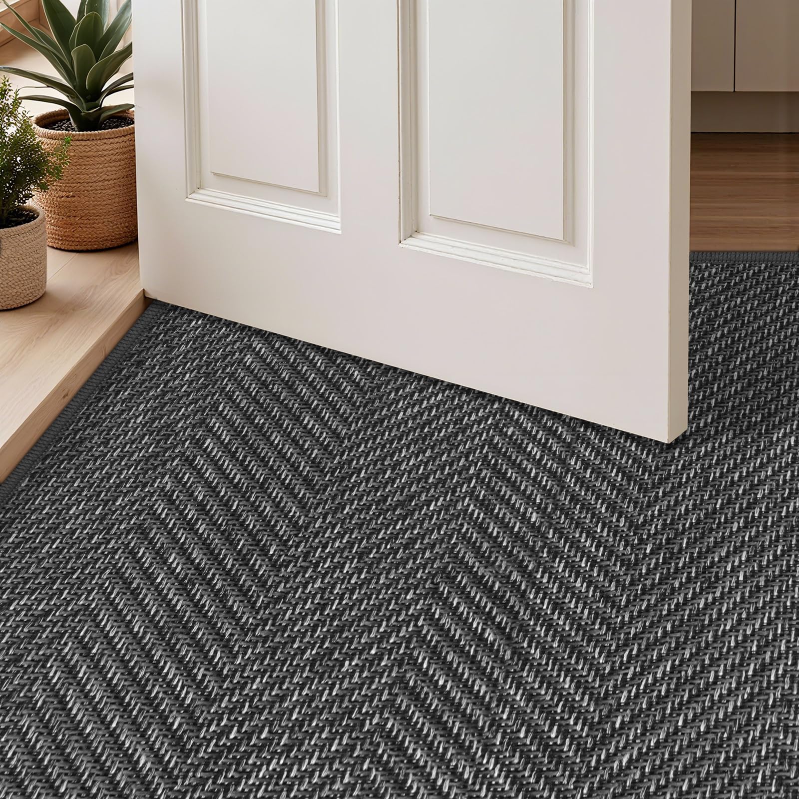 ENHASIV absorbent entry mat suitable for rain, snow, and muddy footprints.