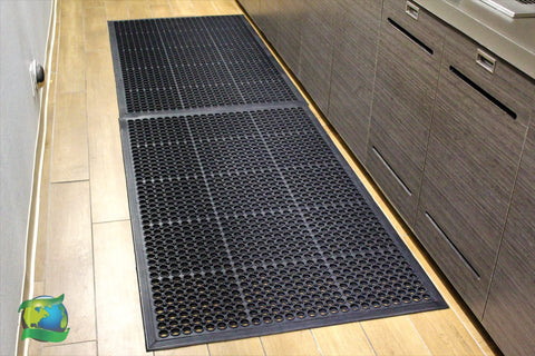 Envelor indoor-outdoor perforated mat simplifies cleaning.