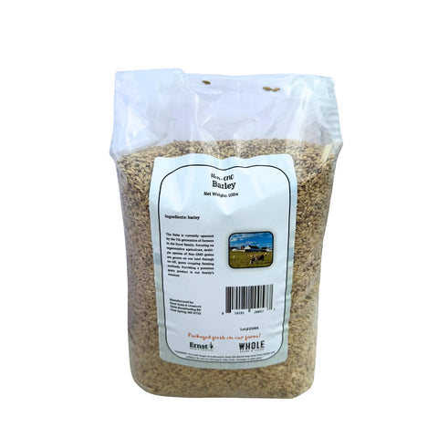 Ernst Grain & Livestock 10 lb bulk barley bag on a farm shelf for easy storage.