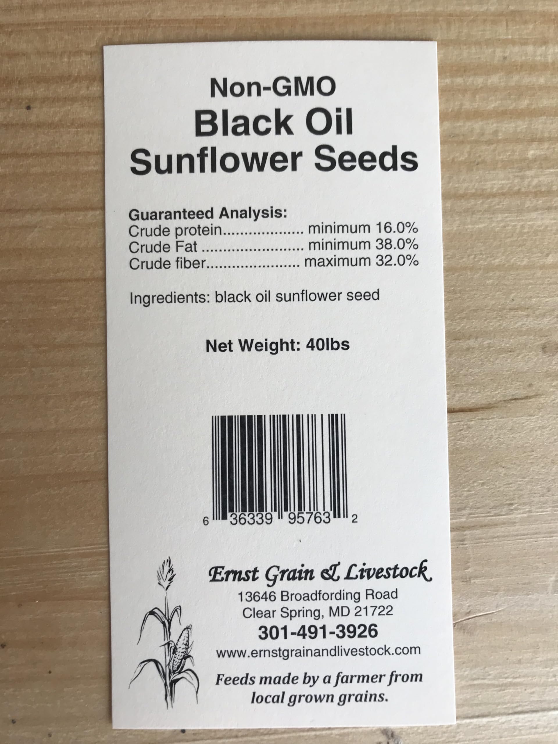 Ernst Grain & Livestock woodpeckers feeding on sunflower seeds.