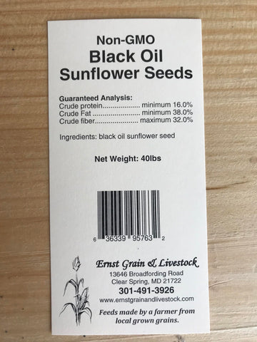 Ernst Grain & Livestock woodpeckers feeding on sunflower seeds.