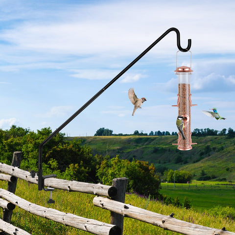 ERYTLLY lanterns and wind chimes suspended by a sturdy deck hook.