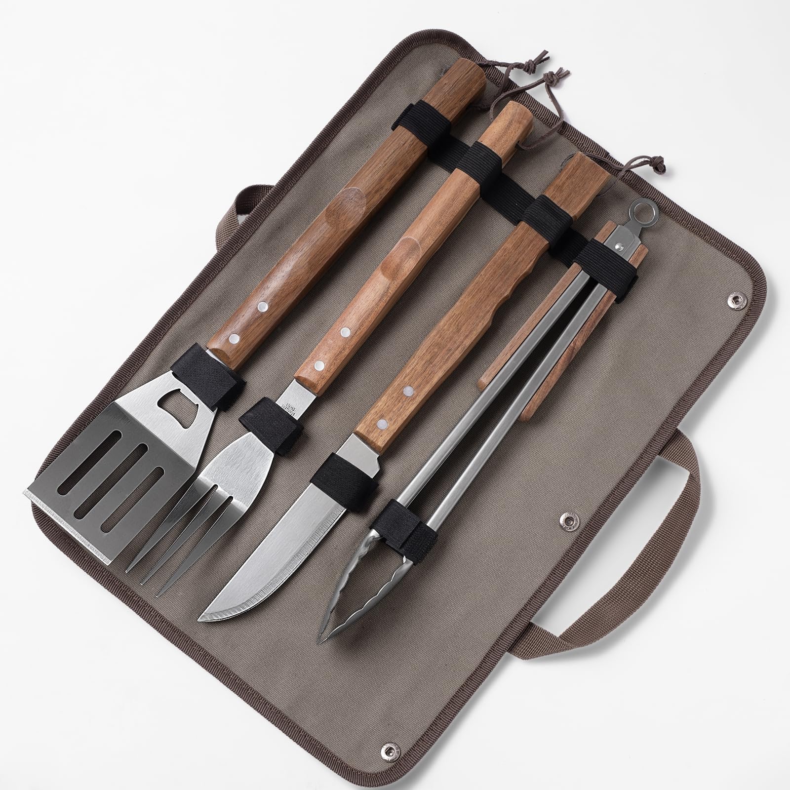 Esie Houzie tools shown sizzling on a grill setup.