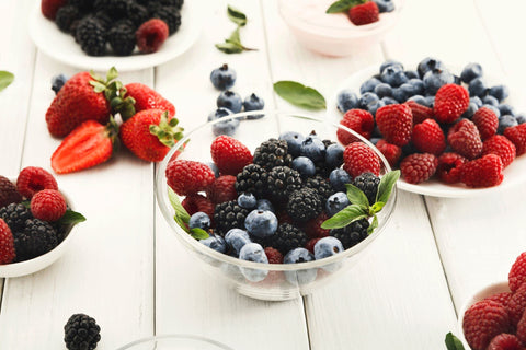 Packaging highlights environmentally safe, no sludge ingredients for berry plants.
