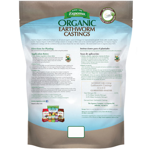 Espoma Organic Earthworm Castings spread on soil—improves structure for thriving outdoor and indoor plants.