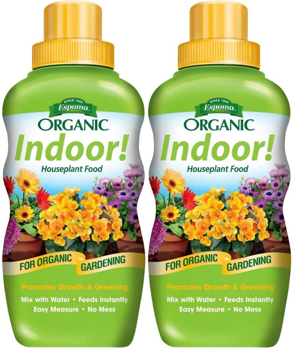 Espoma Indoor Liquid Plant Food bottle poured for easy feeding and healthier houseplants.