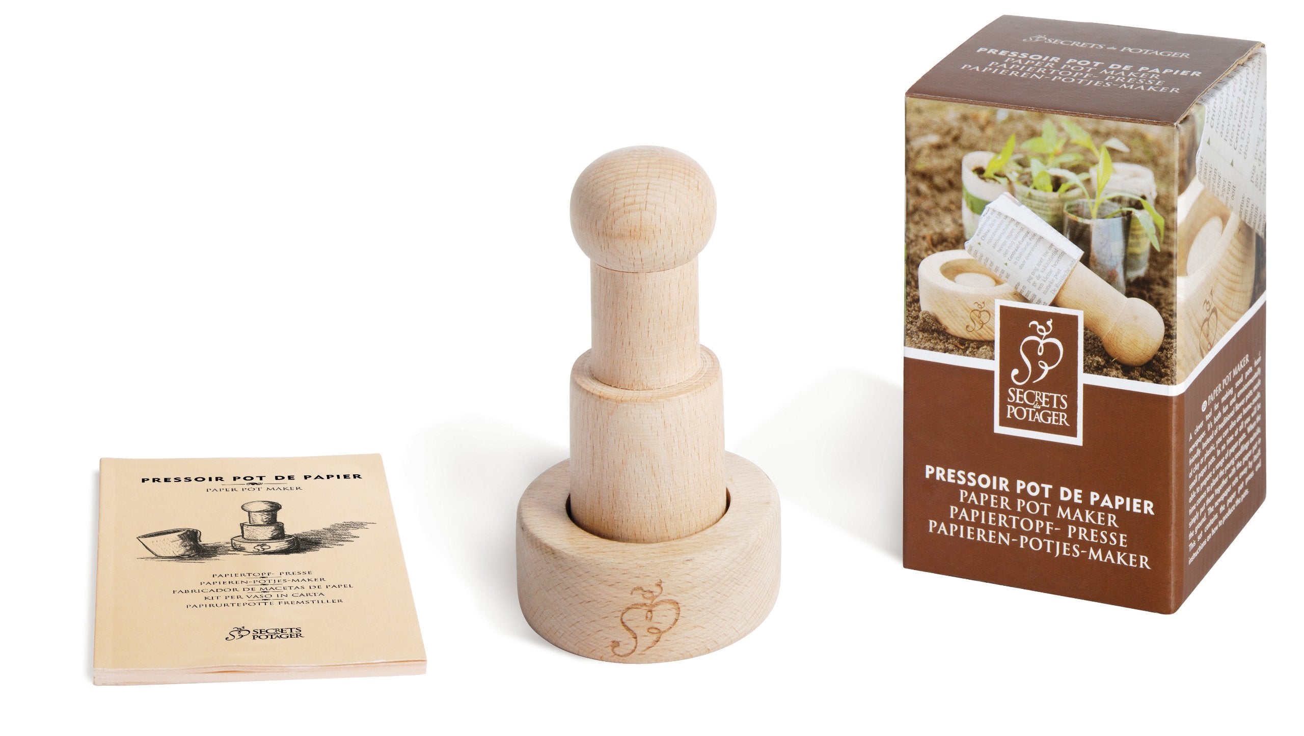 Esschert Design paper pot maker creating biodegradable seed pots for seedlings.