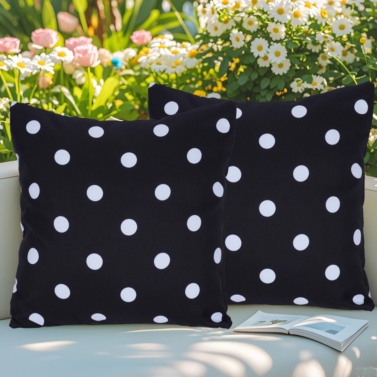Eternal Beauty outdoor pillow cover in black-white polka dot offers weather resistance.