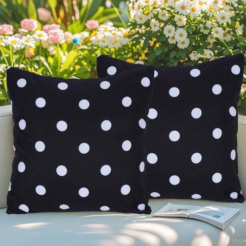 Eternal Beauty outdoor pillow cover in black-white polka dot offers weather resistance.