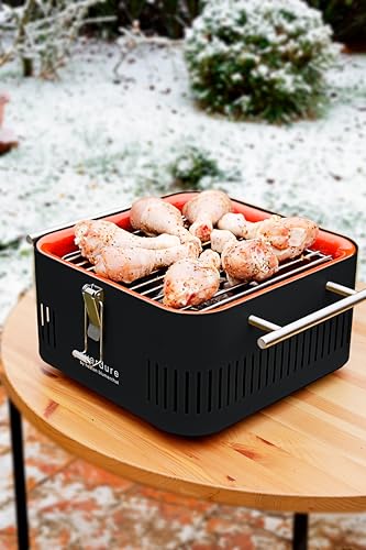 Everdure CUBE removable grill rack simplifies cleaning after grilling.