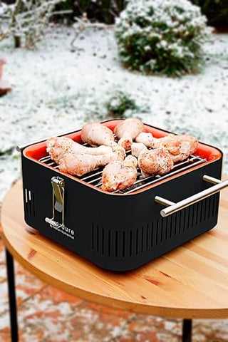 Everdure CUBE removable grill rack simplifies cleaning after grilling.