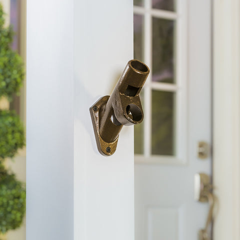 Bronze finish closeup of Evergreen Flag Bracket showing durable cast-iron construction.