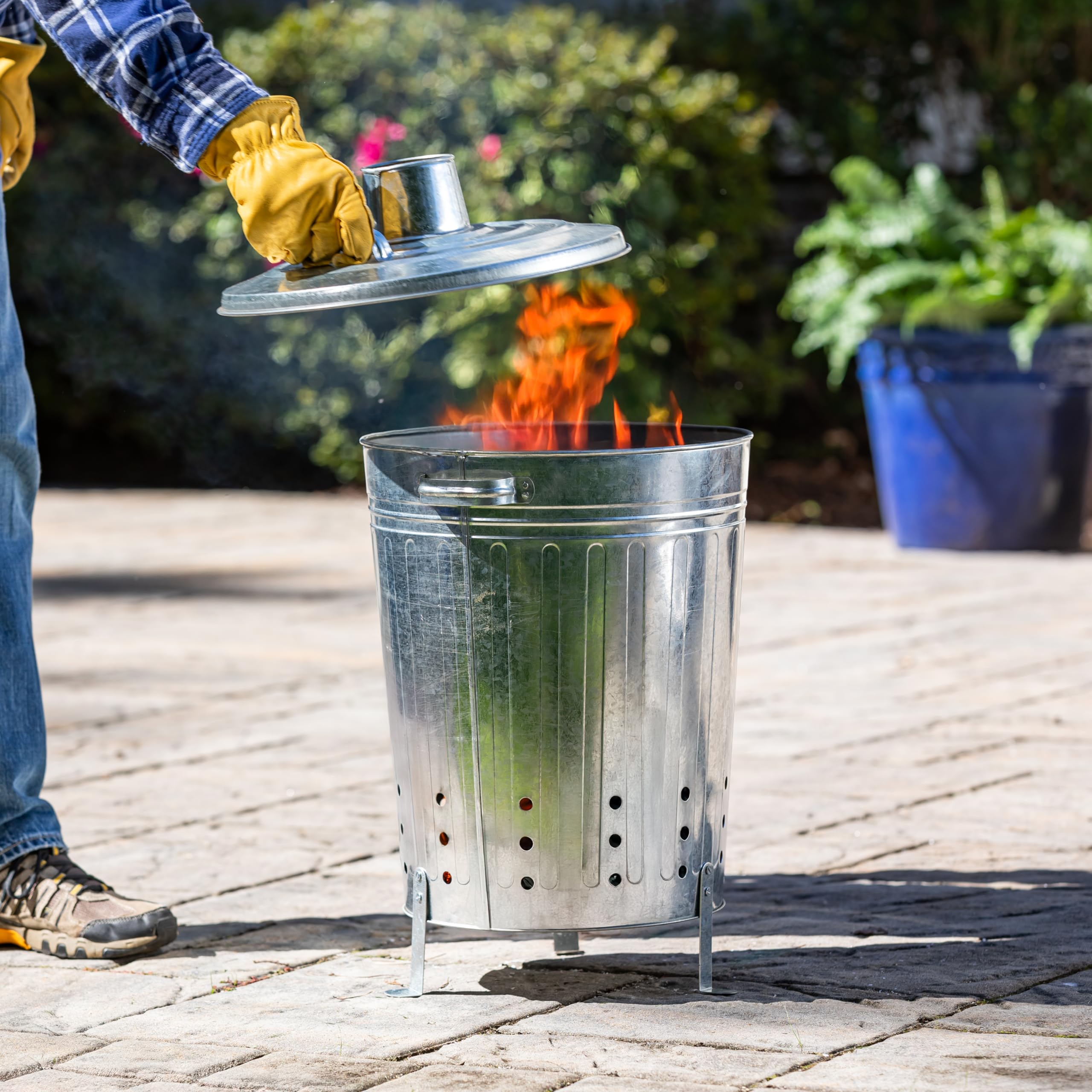 Evergreen Garden incinerator burn barrel with lid, outdoor use for yard waste disposal.