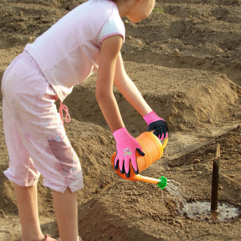 Evridwear pink kids gardening gloves in-use scene encourages outdoor play