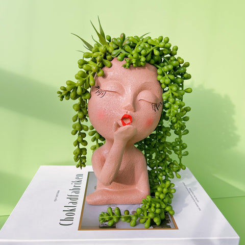 EylbKey DIY-friendly planter for hair-like plants and accessories.