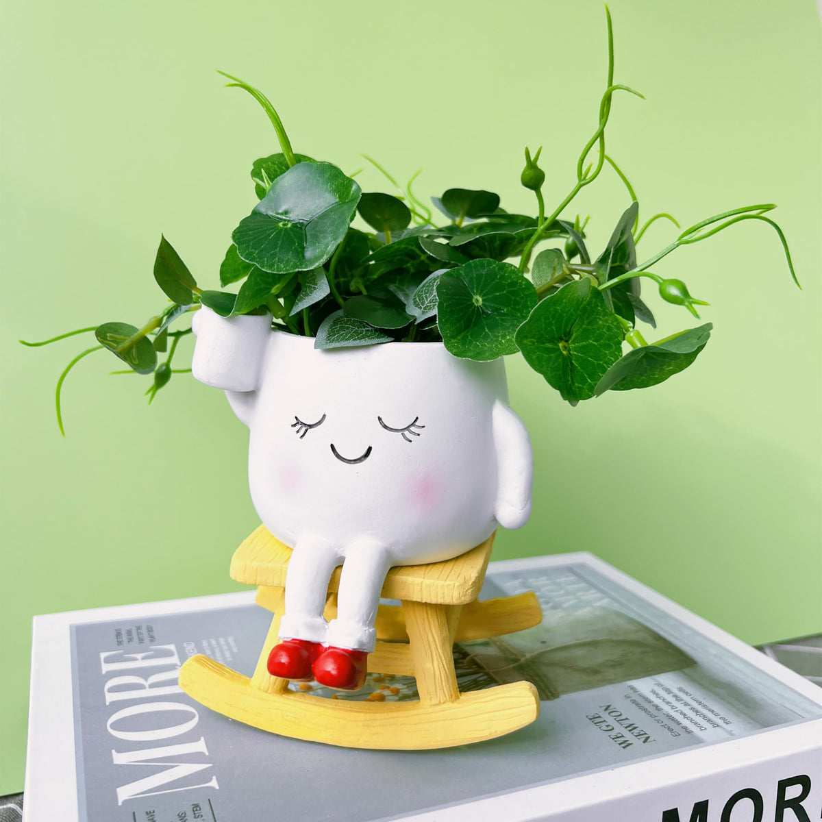 EylbKey cute rocker planter with a rocking base, ideal for small desk succulents.