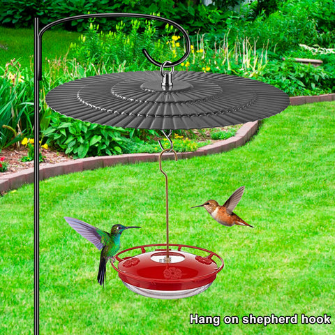 Eyrosa shield protecting a hummingbird feeder from rain