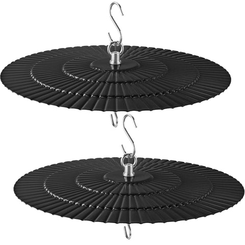 Eyrosa rain guard dome over a bird feeder shielding seeds from sun and rain