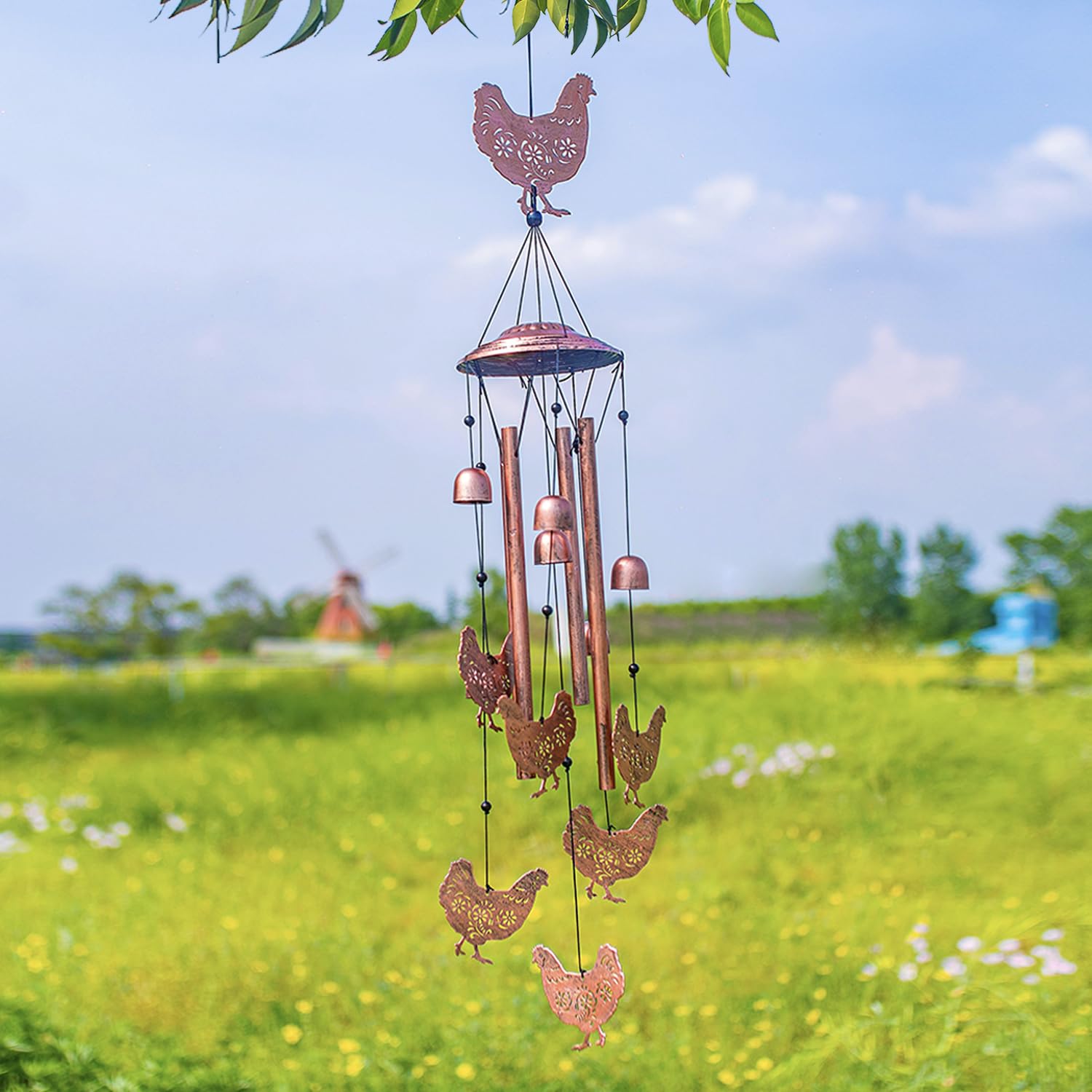 EZTZEN night garden display with gentle chimes enhances outdoor ambiance.