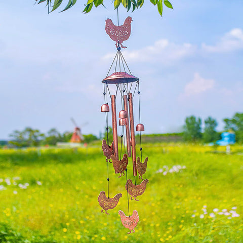 EZTZEN night garden display with gentle chimes enhances outdoor ambiance.