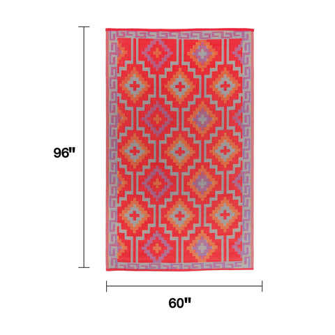 Fab Habitat rug laid on a sunny patio to illustrate space-saving setup.