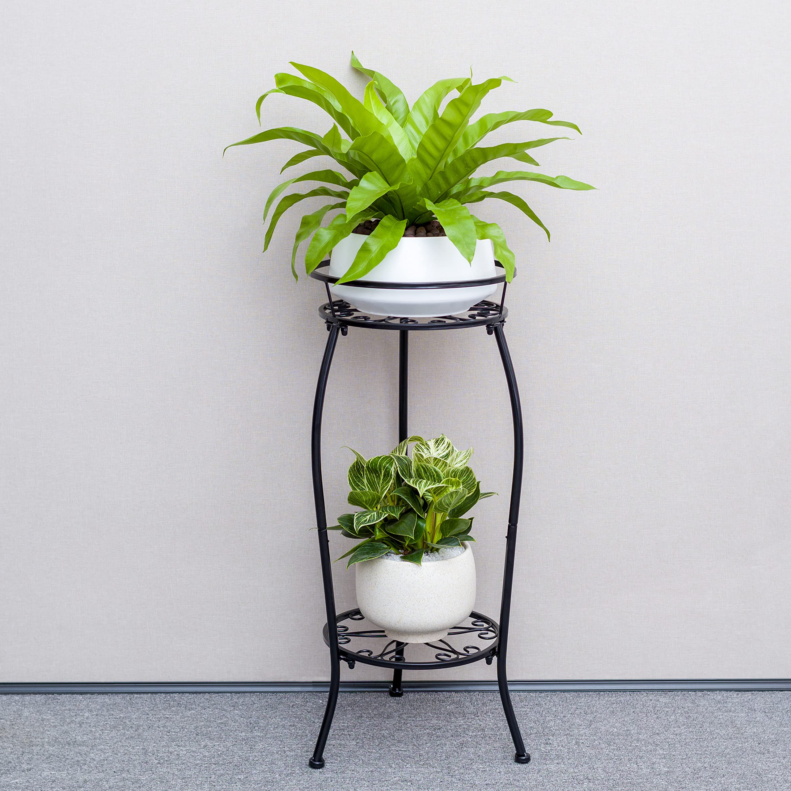 FaithLand black metal stand fits indoor and outdoor environments gracefully
