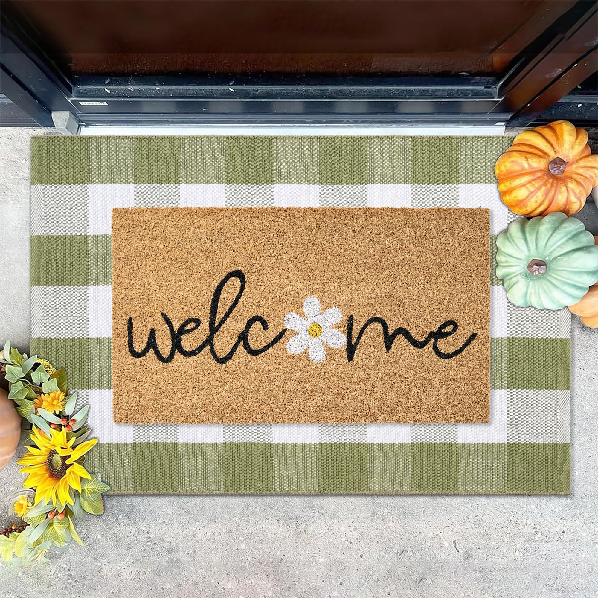 Fallovea entryway porch setup showing coordinated mat and rug.